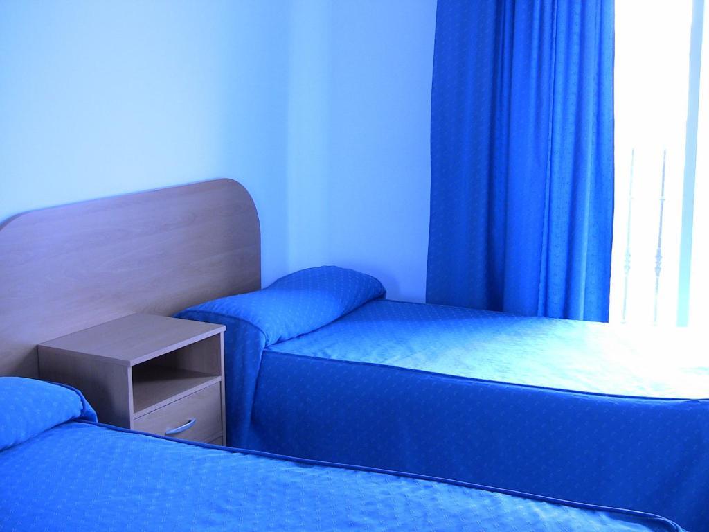 Apartahotel Los Hermanos Ocaña 部屋 写真