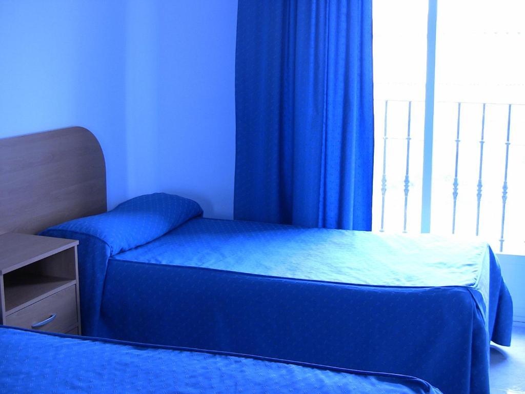 Apartahotel Los Hermanos Ocaña 部屋 写真