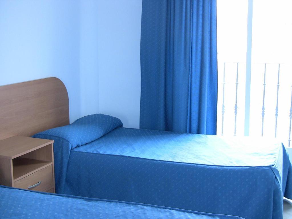 Apartahotel Los Hermanos Ocaña 部屋 写真
